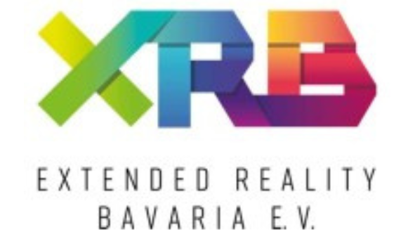 Buntes, geometrisches „XRB“-Logo in Regenbogenfarben mit dem Text „Extended Reality Bavaria e.V.“ darunter.