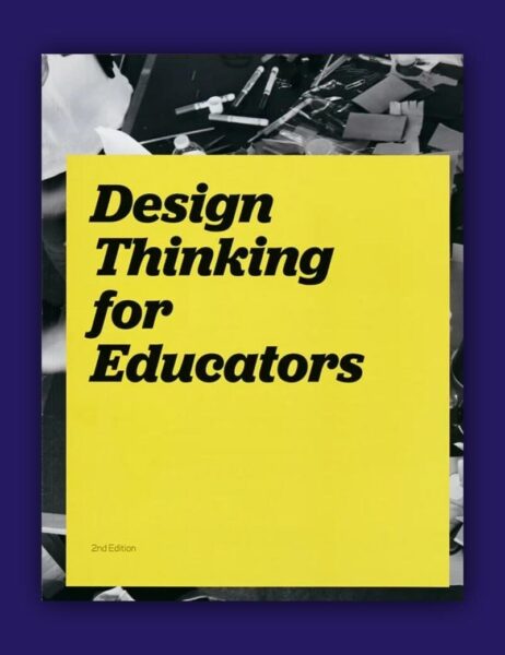 Buchcover mit gelbem Titelblock „Design Thinking for Educators“ in schwarzer Schrift, Hintergrund mit verstreuten Bastelmaterialien und Werkzeugen.